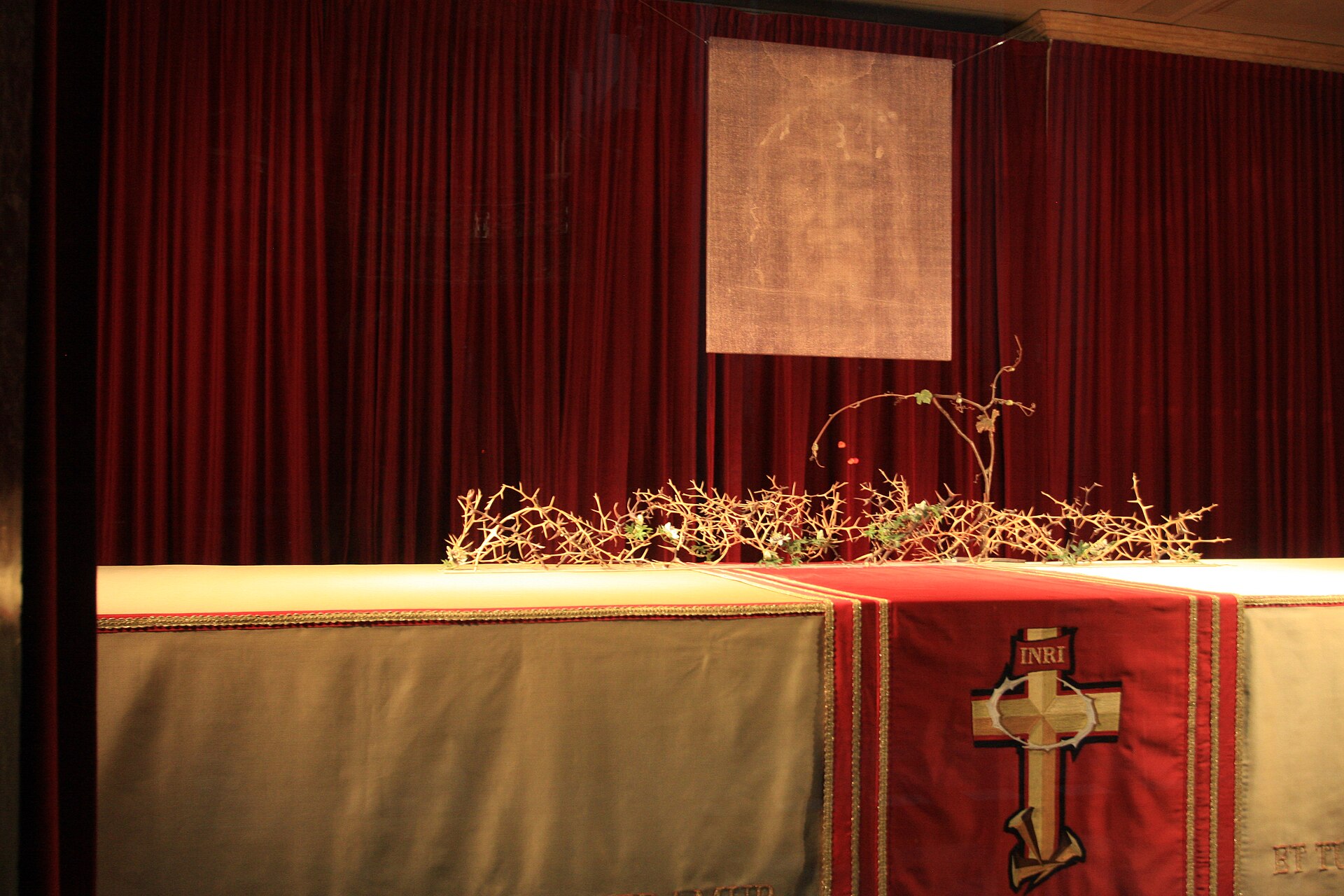 A copy of the Shroud of Turin displayed above an altar in Turin