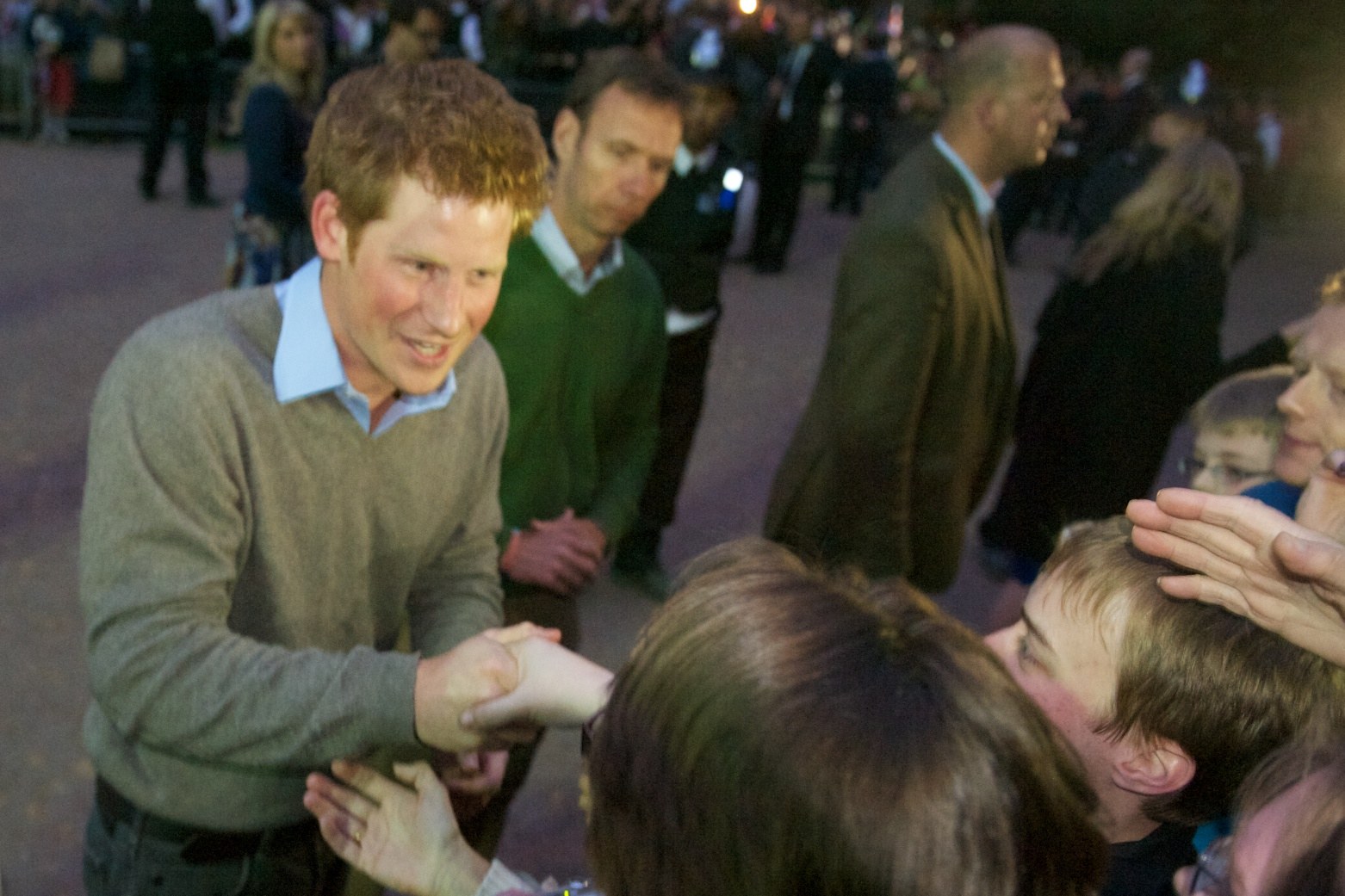 Prince Harry greeting people